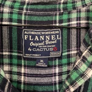 Long sleeve flannel button down shirt. Green plaid. Size XL. Great condition